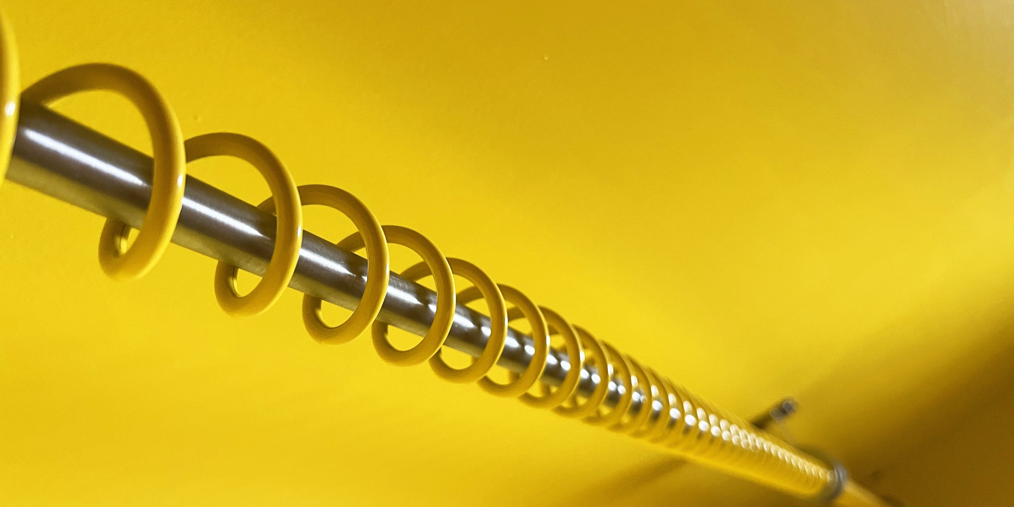 Bright yellow clothes rail