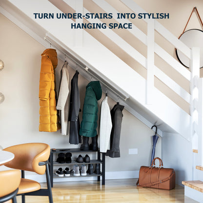 Zebedee under-stairs storage solution with hanging space for coats and shoes.