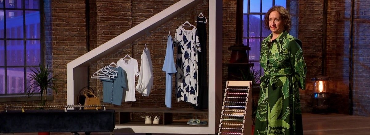 Business owner showcasing an angles clothing railing on television show, Dragon's Den