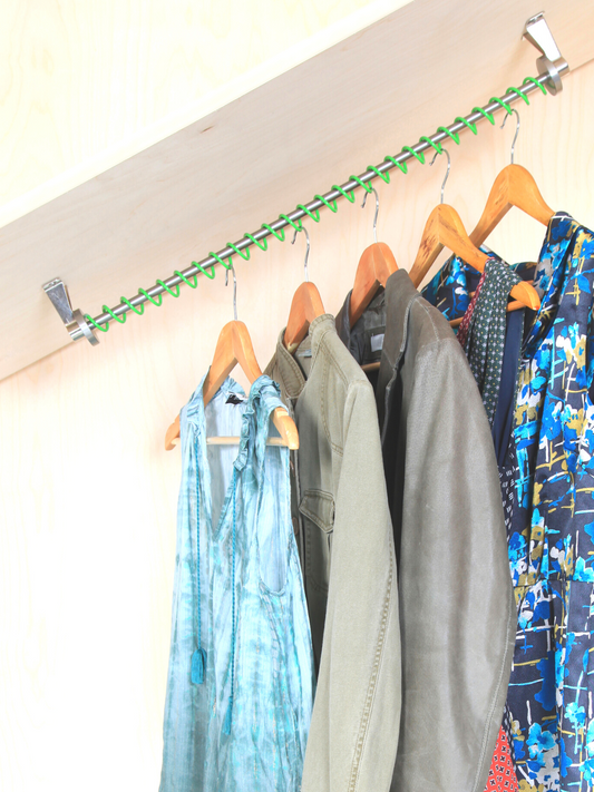 Zebedee Green top mounted sloping clothes rail fixed to a sloped ceiling