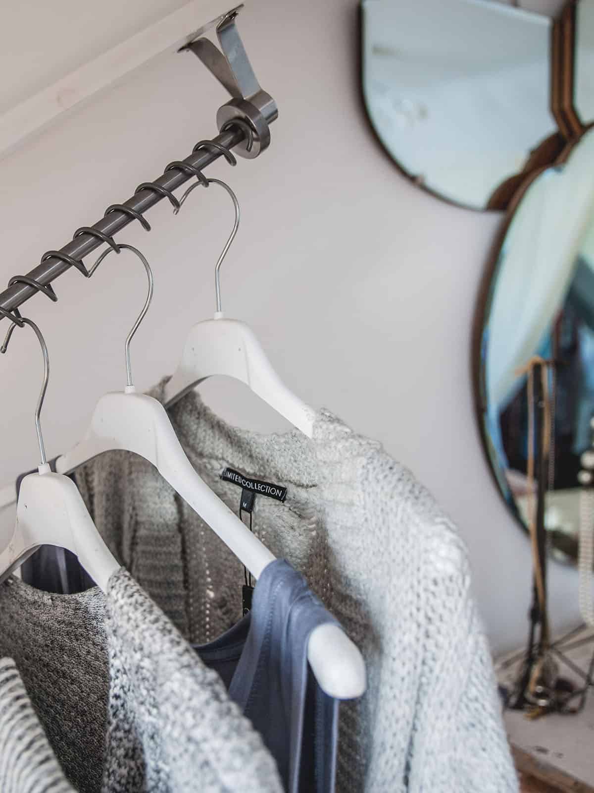 Zebedee Any Angle Hanging Rail - Dove grey - shown with hanging clothes
