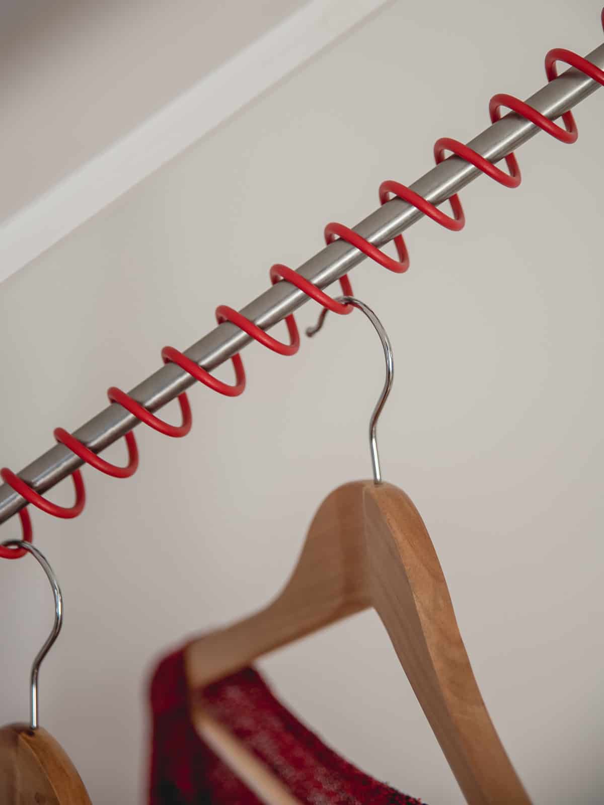 Zebedee Any Angle Hanging Rail - Close Up with Coat Hanger